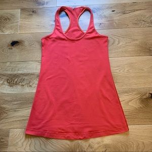 Lululemon racerback athletic tank. Size 6. Bright orange.